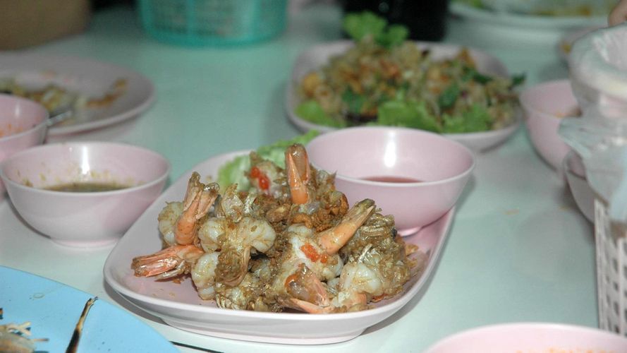 Fried prawns on table.