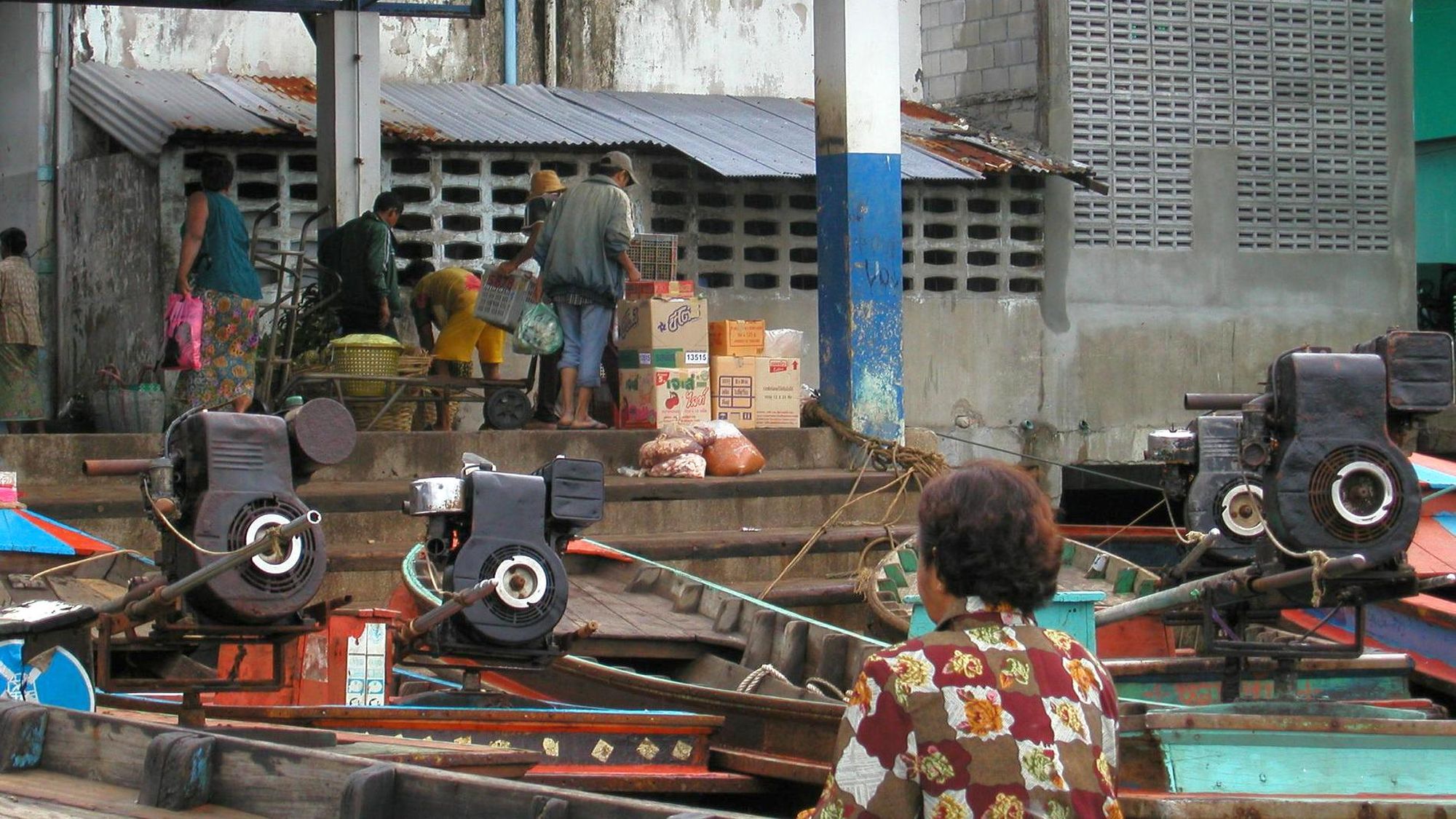 Long tail boats with market.