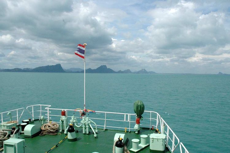 Off the bow of the the Koh Samui to Donsak ferry we spot the Thailand Mainland.