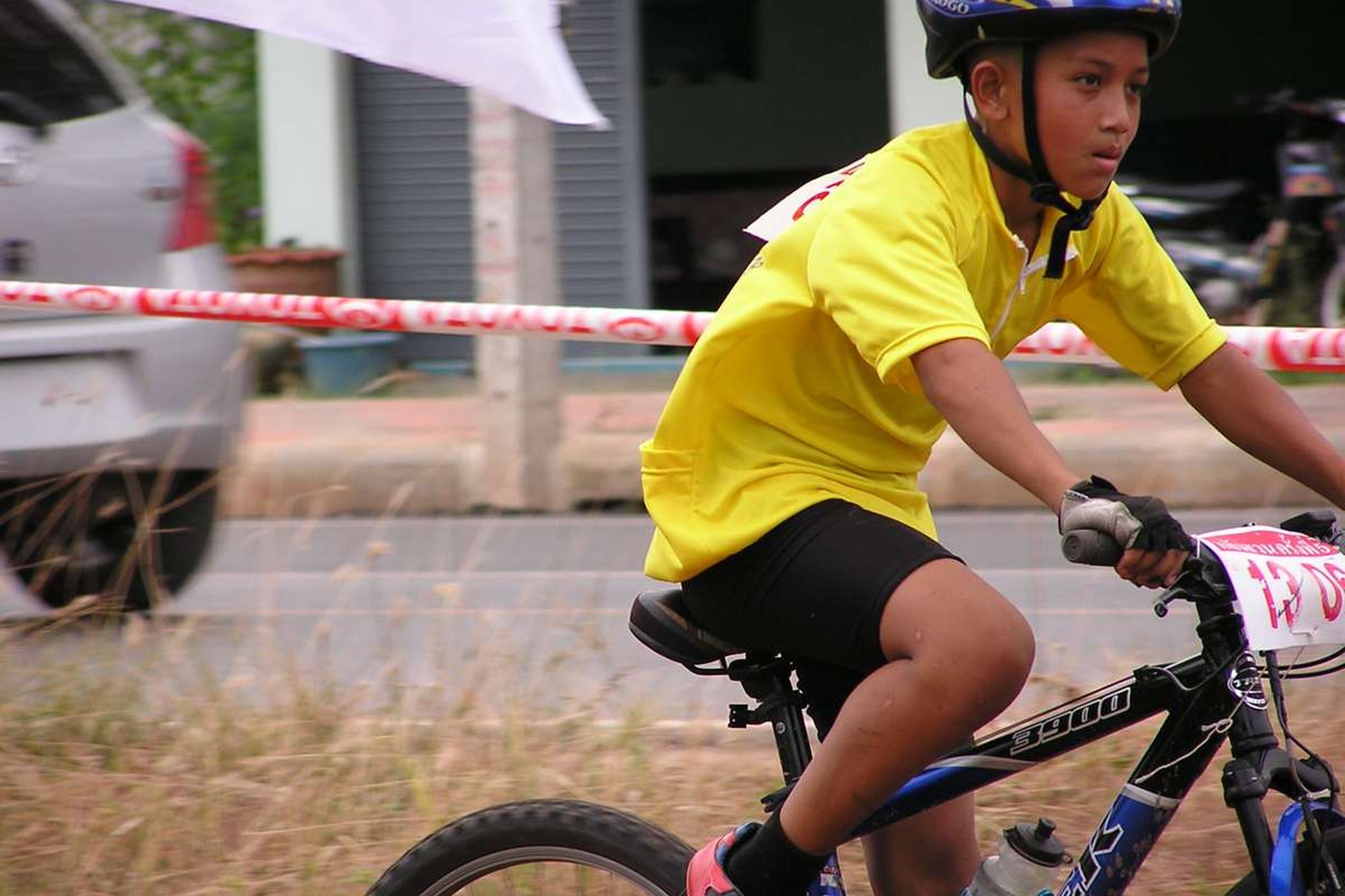 Young Thai bicyclist at the start of the Kiansa Race.